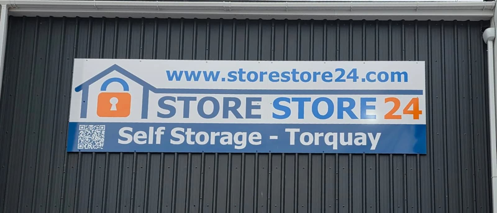 Store Store 24 self storage facility signage on Castle Lane, Torquay